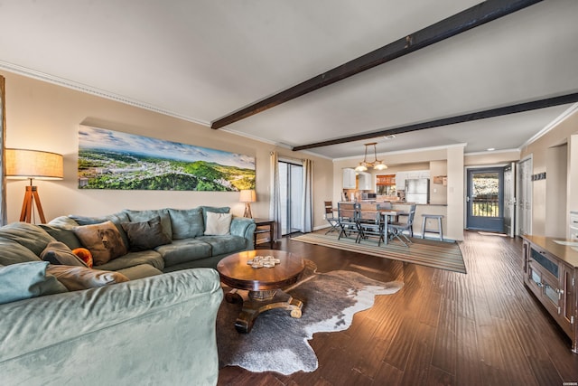 living area with crown molding, baseboards, dark wood finished floors, and beamed ceiling