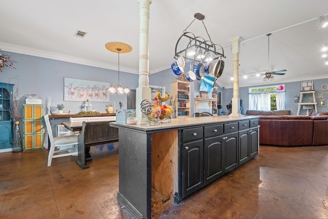 114 Cliffwood Loop, Hot Springs, AR 71913 - kitchen featuring a ceiling fan, crown molding, open floor plan, dark cabinetry, and a center island