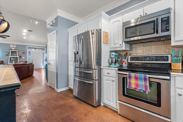 114 Cliffwood Loop, Hot Springs, AR 71913 - kitchen with appliances with stainless steel finishes, ornamental molding, tasteful backsplash, open floor plan, and white cabinets