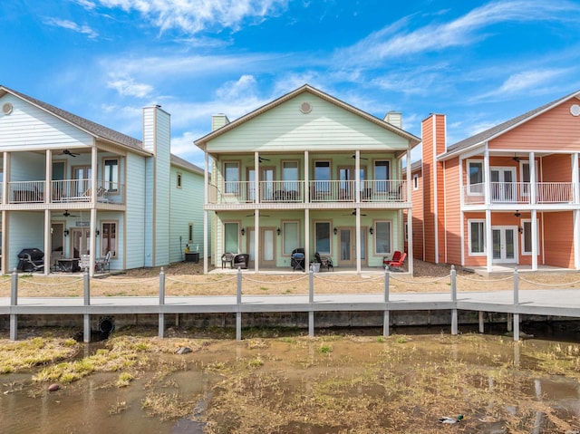 128 Kaleigh Ct Unit B, Hot Springs, AR 71913 - rear view of property with ceiling fan, a balcony, french doors, and a water view