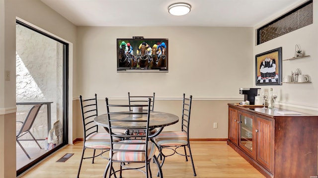 270 Lake Hamilton Dr Unit D6, Hot Springs, AR 71913 - dining space with light wood-type flooring and baseboards
