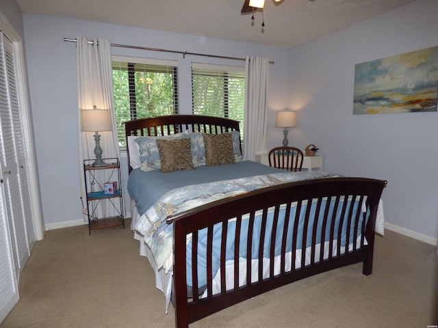 400 Farr Shores Dr Unit 2E, Hot Springs, AR 71913 - bedroom featuring carpet flooring, baseboards, and a ceiling fan