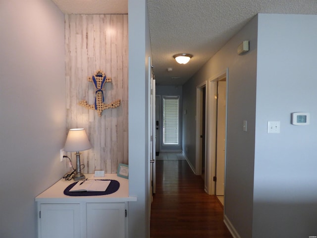 400 Farr Shores Dr Unit 2E, Hot Springs, AR 71913 - hallway featuring a textured ceiling, dark wood-type flooring, and wooden walls