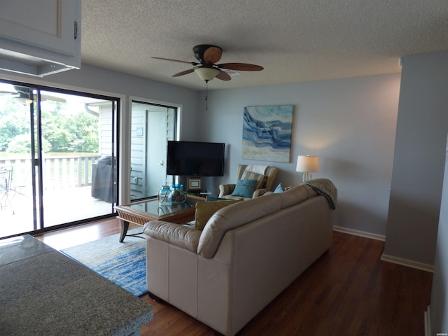 400 Farr Shores Dr Unit 2E, Hot Springs, AR 71913 - living area featuring ceiling fan, a textured ceiling, dark wood-style floors, and baseboards