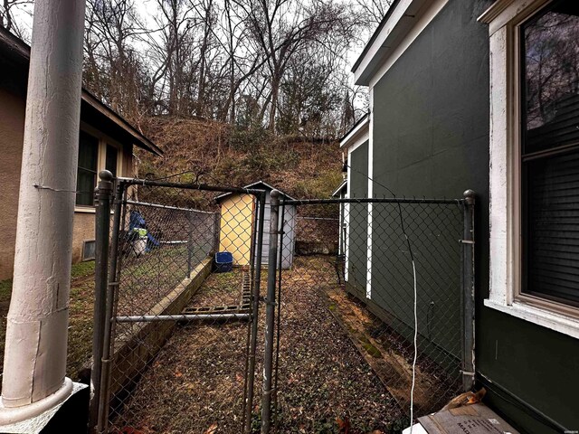 view of yard with a gate and fence