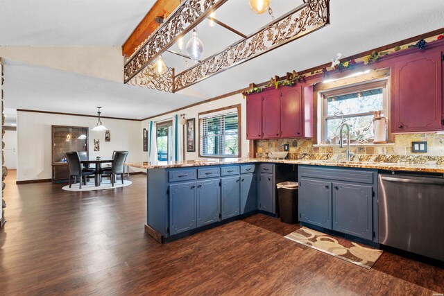 kitchen with dishwasher, light countertops, tasteful backsplash, and dark wood-style floors