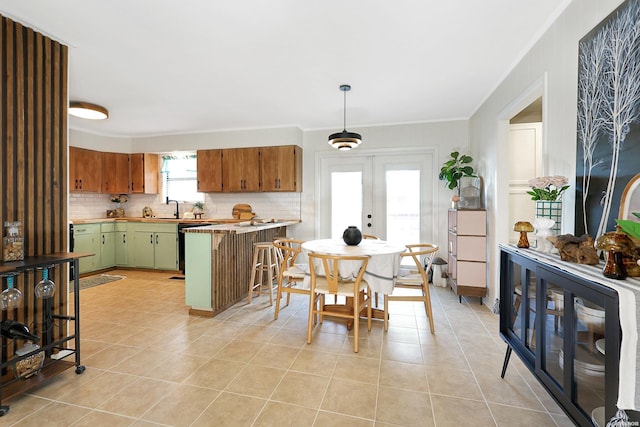 1405 Emory St, Hot Springs, AR 71913 - dining space featuring light tile patterned floors and ornamental molding