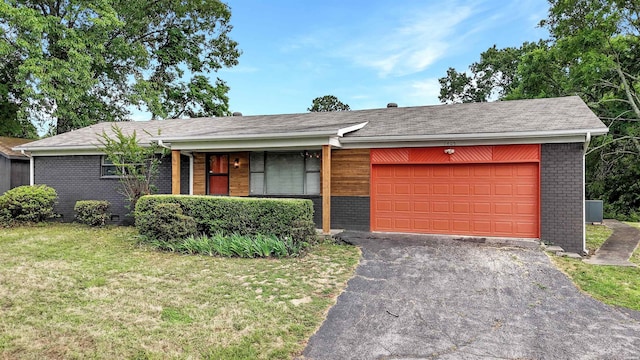 1405 Emory St, Hot Springs, AR 71913 - single story home with asphalt driveway, a front lawn, brick siding, an attached garage, and covered porch