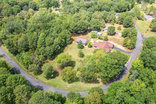 drone / aerial view with a view of trees