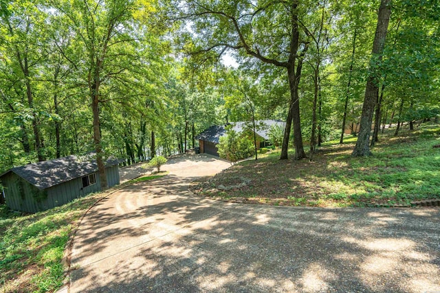 1200 Rock Creek Rd, Hot Springs, AR 71913 - view of concrete driveway with a view of trees