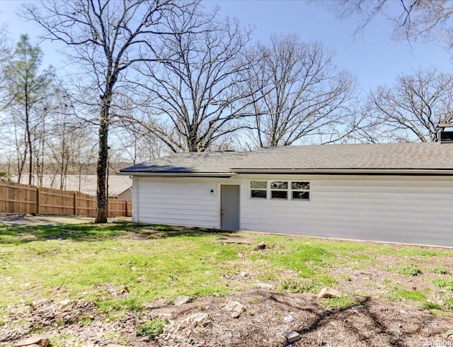 garage featuring fence