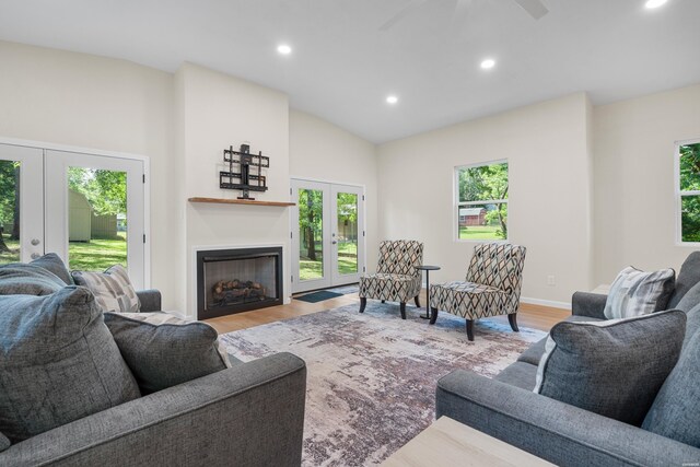 106 Grissom Trl, Hot Springs, AR 71913 - living area featuring french doors, wood finished floors, recessed lighting, lofted ceiling, and a fireplace