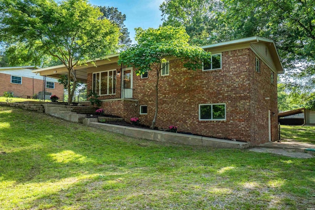 106 Grissom Trl, Hot Springs, AR 71913 - back of house with brick siding and a yard