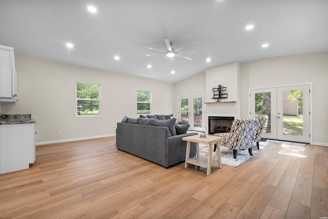 106 Grissom Trl, Hot Springs, AR 71913 - living room featuring french doors, ceiling fan, a fireplace, light wood-type flooring, and recessed lighting