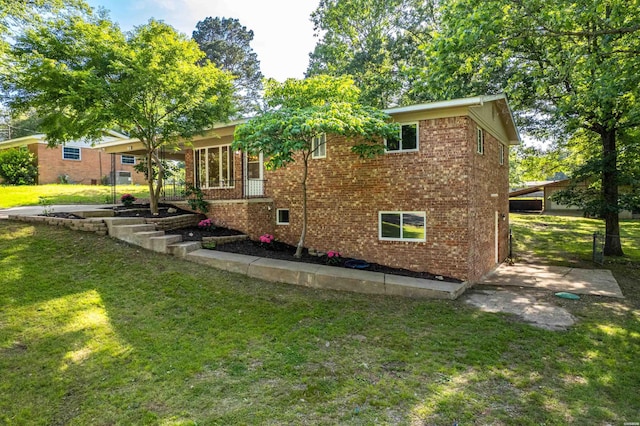 106 Grissom Trl, Hot Springs, AR 71913 - view of side of property featuring a yard and brick siding