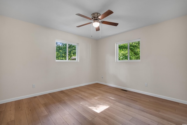 106 Grissom Trl, Hot Springs, AR 71913 - empty room featuring plenty of natural light, baseboards, and ceiling fan