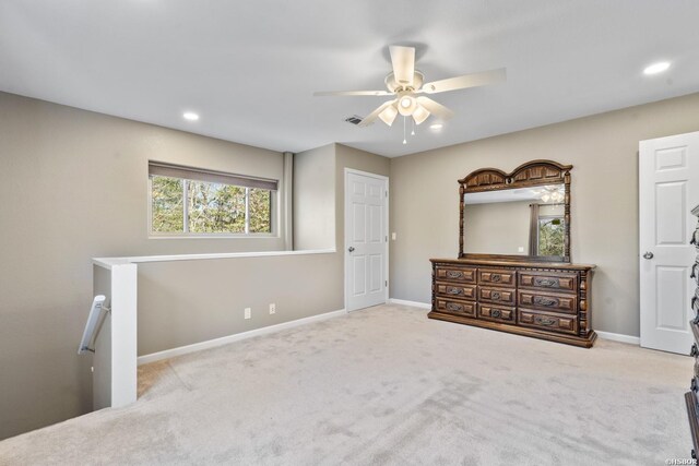 bedroom with recessed lighting, light colored carpet, visible vents, and baseboards