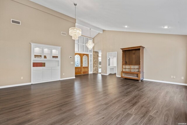 unfurnished living room featuring dark wood-type flooring, beamed ceiling, visible vents, and a notable chandelier