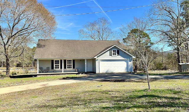 view of front of home featuring concrete driveway, a porch, and a front lawn