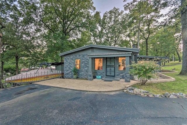 view of front of property featuring stone siding