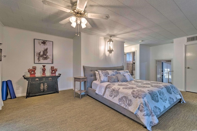 bedroom featuring visible vents, ceiling fan, carpet flooring, and baseboards