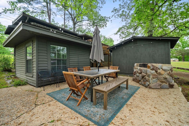 view of patio with outdoor dining area
