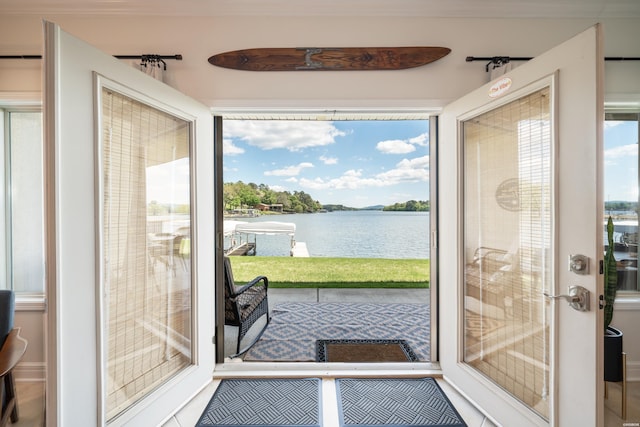 entryway featuring a water view and plenty of natural light