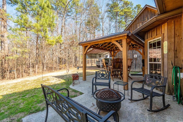 view of patio featuring a fire pit