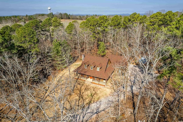 bird's eye view with a view of trees