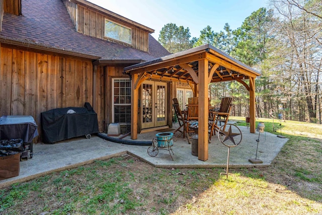 view of patio / terrace featuring french doors and grilling area