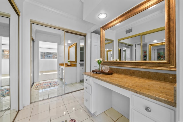 1201 Lakeshore Dr Unit 25, Hot Springs, AR 71913 - bathroom with tile patterned floors, visible vents, crown molding, and vanity