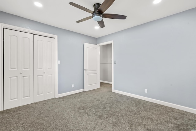 unfurnished bedroom with recessed lighting, a closet, carpet flooring, ceiling fan, and baseboards