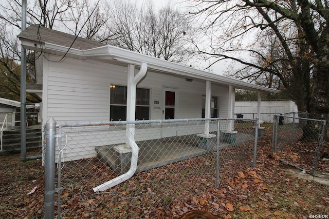 view of property exterior with fence