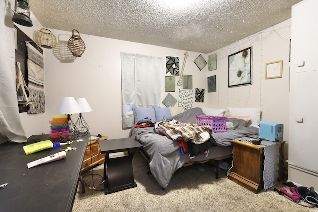 carpeted bedroom featuring a textured ceiling