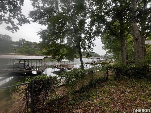 dock area featuring a water view