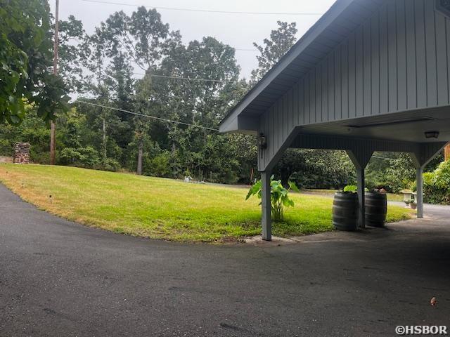 view of community featuring a yard