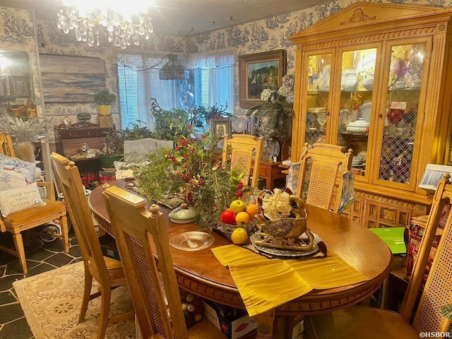 dining room with wallpapered walls