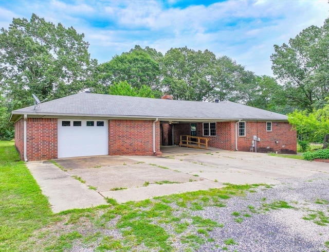 427 Morrison Rd, Arkadelphia, AR 71923 - view of side of property featuring an attached garage, concrete driveway, brick siding, and a chimney