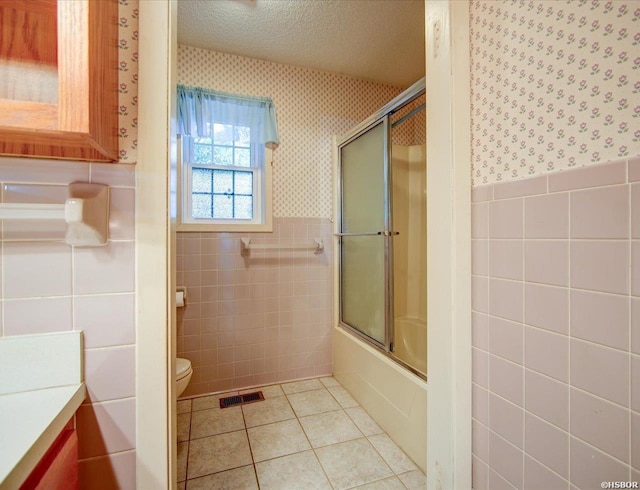 427 Morrison Rd, Arkadelphia, AR 71923 - bathroom with tile walls, wallpapered walls, tile patterned floors, vanity, and a wainscoted wall