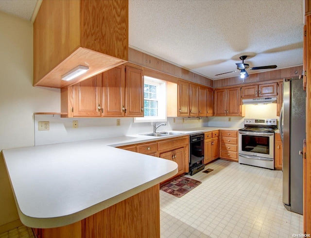 427 Morrison Rd, Arkadelphia, AR 71923 - kitchen with appliances with stainless steel finishes, a peninsula, under cabinet range hood, light countertops, and a textured ceiling
