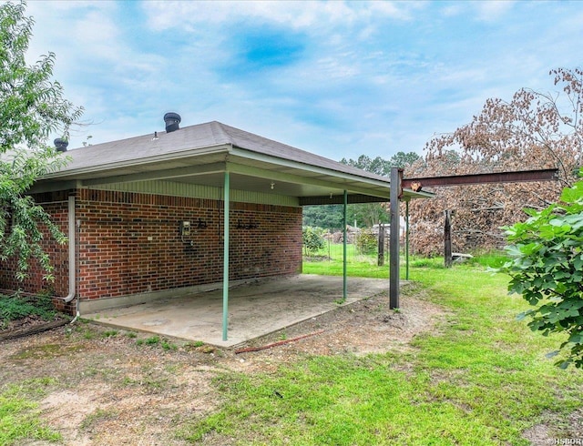 427 Morrison Rd, Arkadelphia, AR 71923 - view of grassy yard with a carport and a patio