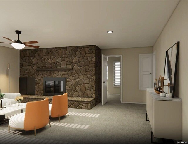 living area with light carpet, a fireplace, a ceiling fan, and baseboards