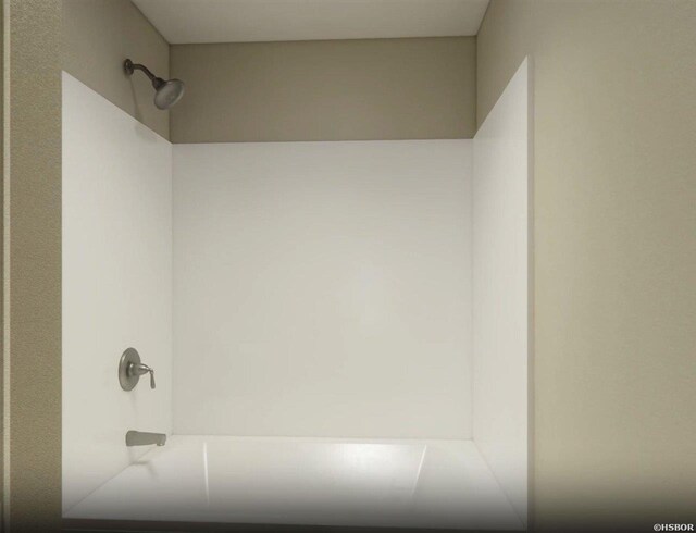 bathroom with shower / bath combination