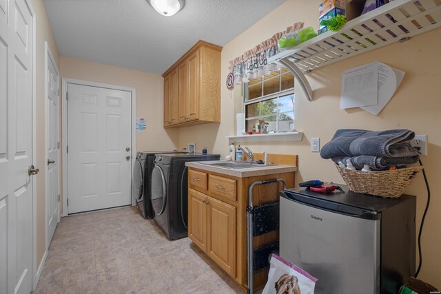 539 Charlie Stover Rd, Royal, AR 71968 - laundry room featuring separate washer and dryer and cabinet space