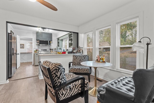 interior space featuring visible vents, a ceiling fan, and a healthy amount of sunlight