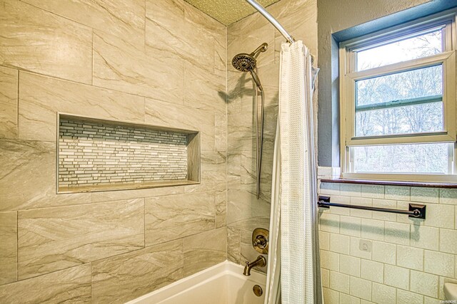 full bath with shower / tub combo