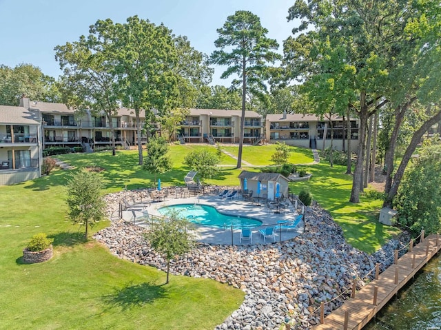 pool with a patio area