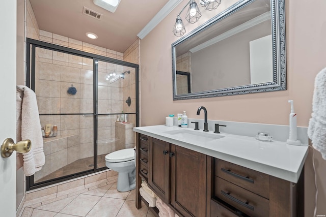 full bath with a stall shower, vanity, visible vents, and crown molding