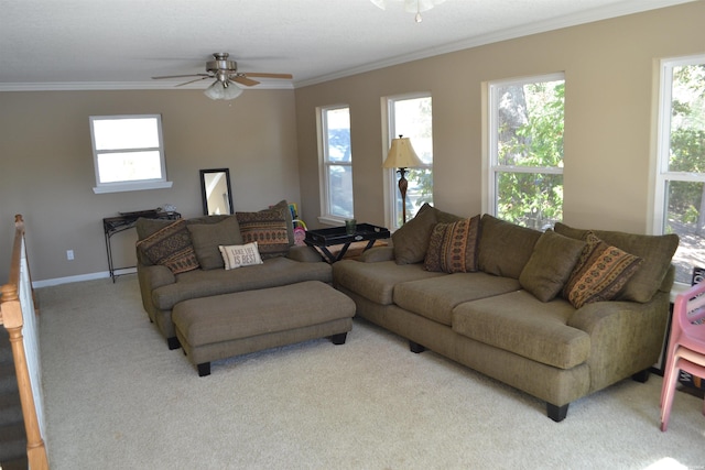 living room with light carpet, ceiling fan, and ornamental molding