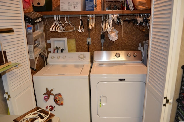 laundry area featuring laundry area and washer and clothes dryer